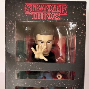 SOLD  Collectible. Stranger Things Eleven Vinyl Figure. By Culturefly
